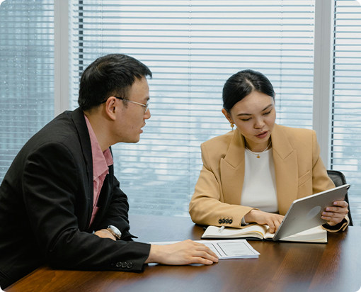 Investors reviewing performance charts and data